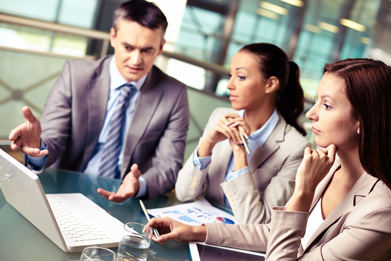 couple discussing financhial issues during divorce mediation